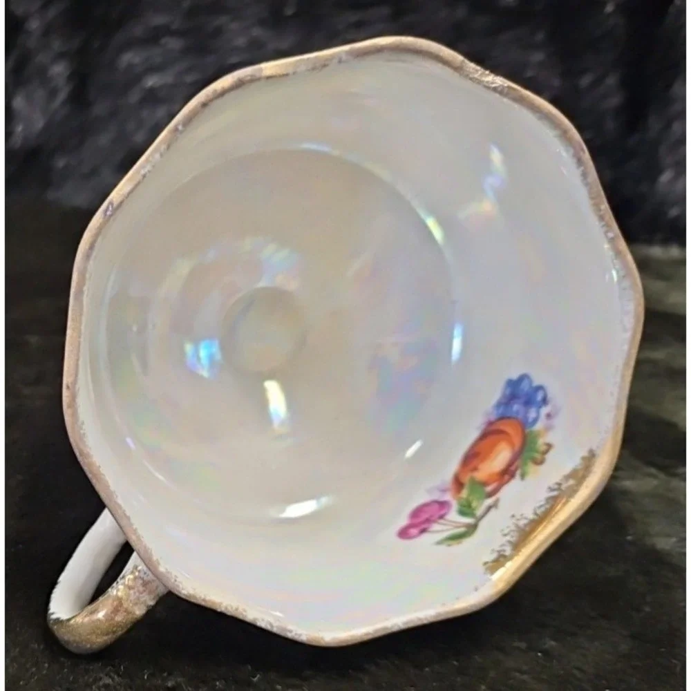 Lusterware Handpainted Fruit with gold finishings,‎ footed cup and saucer set